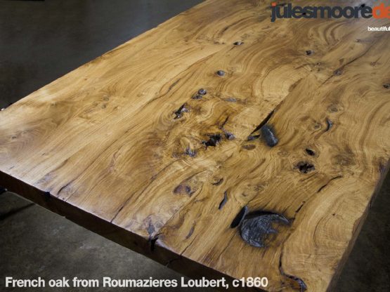 A picture of a french oak piece of wood in the shape of a table from julesmoredesign.com