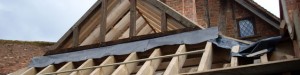 Close look from an oak framed porch in the building process.