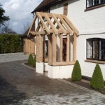 An air dried oak porch in the front of the outside of the house from the right side