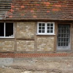 Traditional house wall with windows
