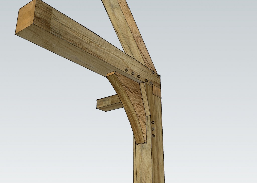 An oak tie beam, principal rafter and post joint detail