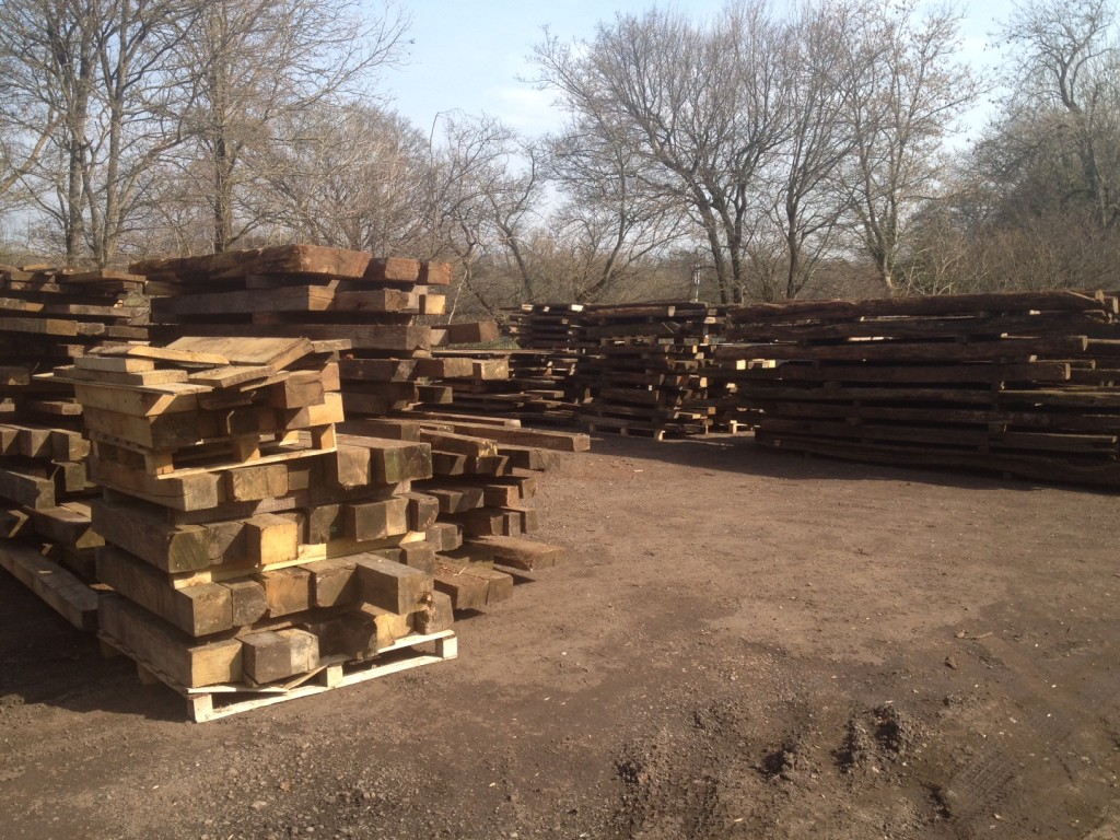 Reclaimed oak beams stock.