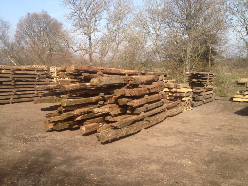 Reclaimed oak beams stock.