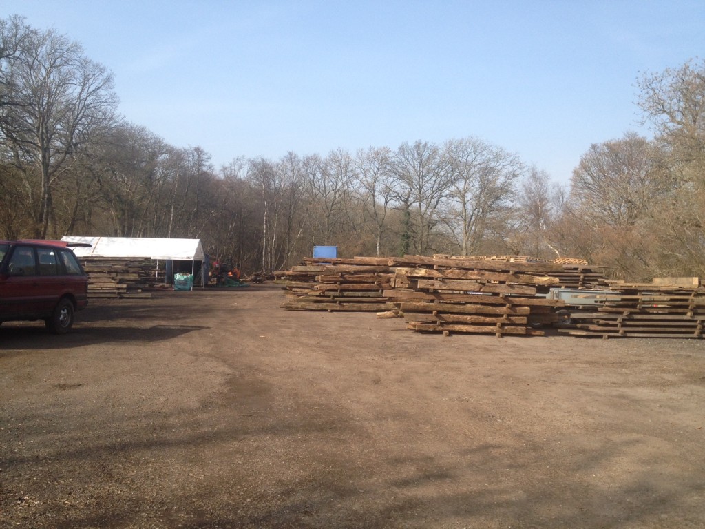 Reclaimed oak beams stock.