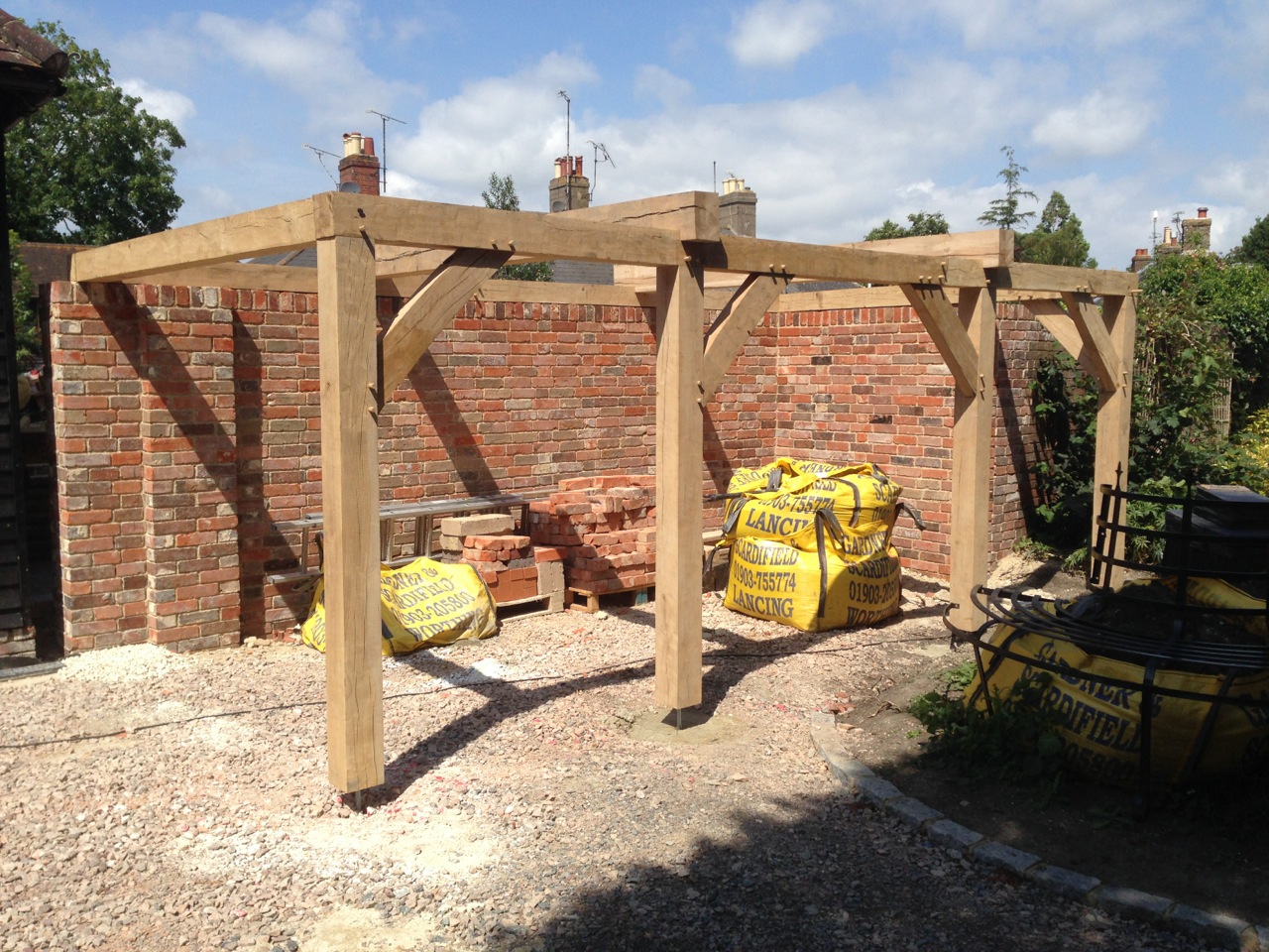 Oak framed carport in construction.