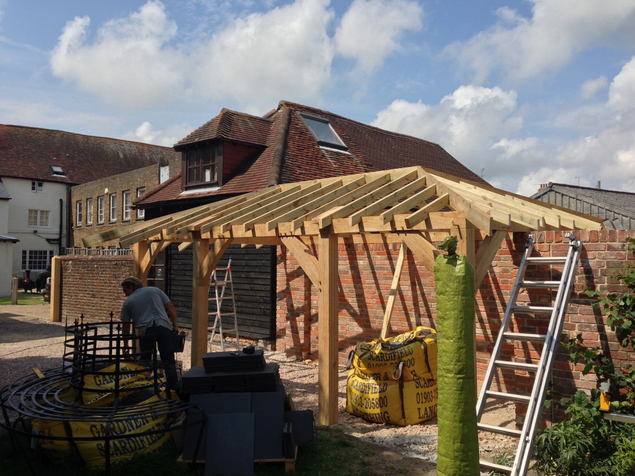 Oak framed carport roof in process.