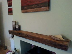 Floating oak beam over a fireplace.