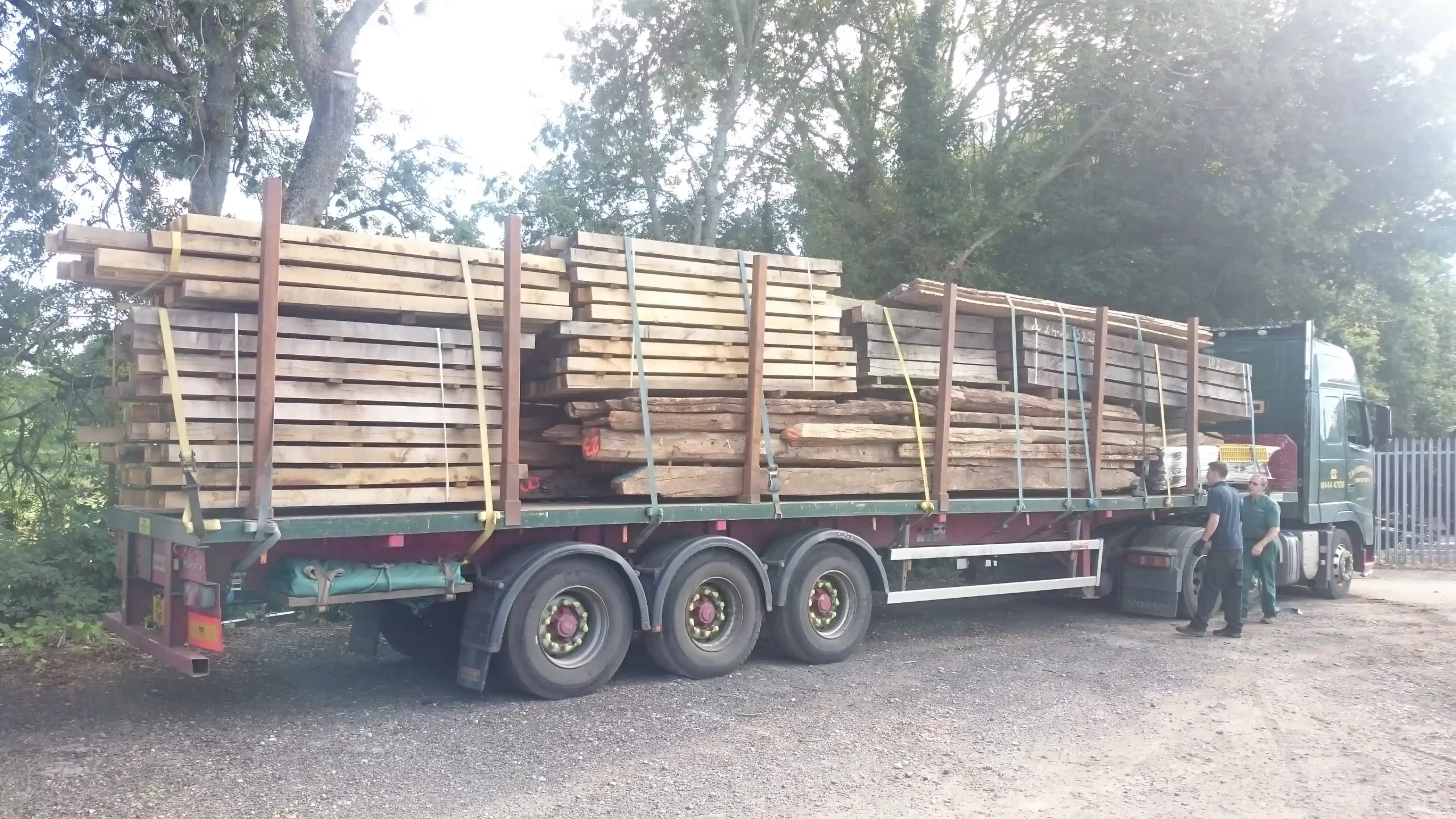 Reclaimed oak beams on top of the truck.