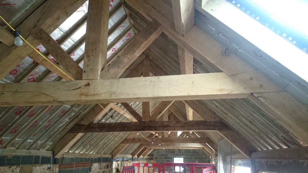 Oak Trusses Large oak trusses in place of construction.
