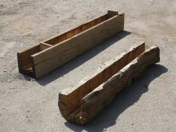 Hollowed oak beams in the floor facing up.