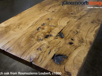 A picture of a french oak piece of wood in the shape of a table from julesmoredesign.com