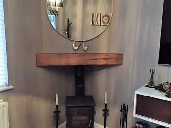 A solid oak fireplace beam created by Tradoak