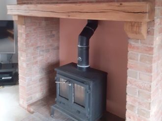 Oak mantels above a fireplace