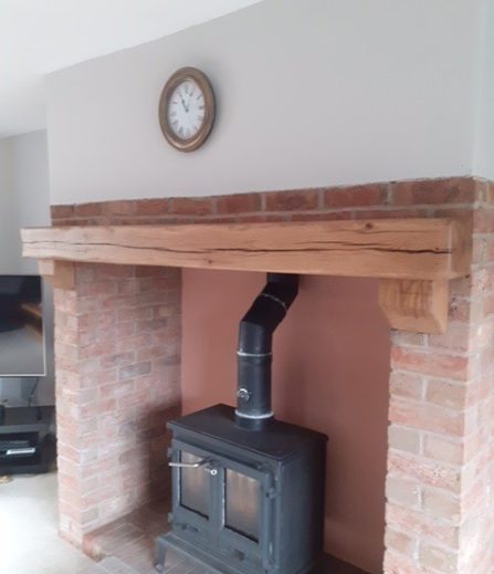 Oak mantels above a fireplace