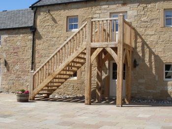 Rustic oak external staircase and porches