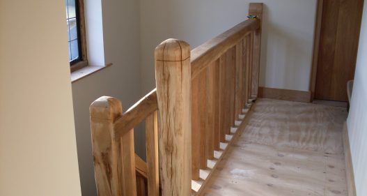 Fall protection fence made of oak beams