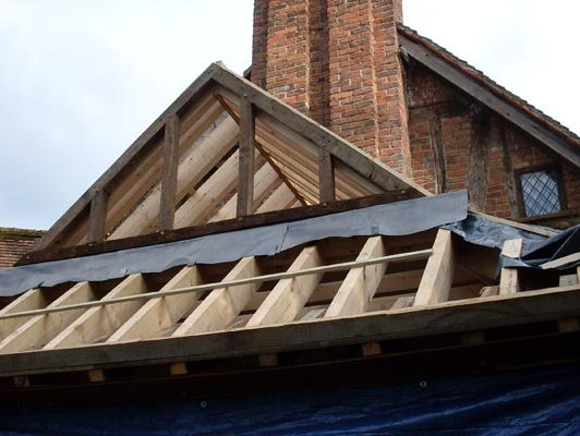 Close look from an oak framed porch in the building process.