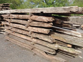 Reclaimed oak beams in the yard