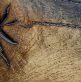 Reclaimed oak that has been sawn, sanded and waxed finish