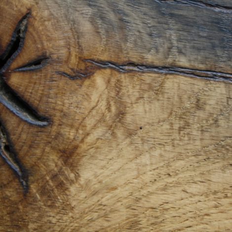 Reclaimed oak that has been sawn, sanded and waxed finish