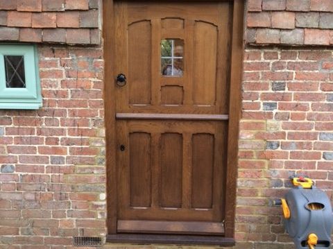 A stable-style oak front door